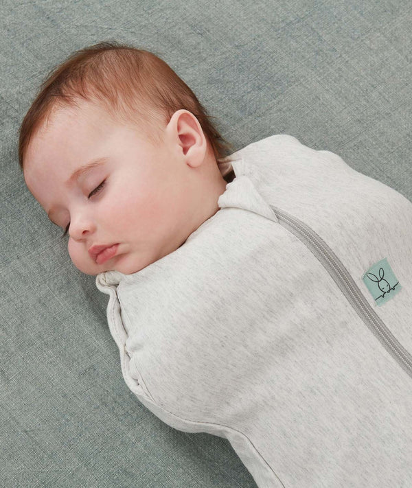 Baby swaddled in an ergoPouch Cocoon Swaddle Sack 0.2 TOG Grey Marle