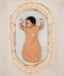 Baby sleeping with arms out in ergoPouch Cocoon Swaddle Sack 0.2 TOG Honey Bees