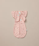 ergoPouch Butterfly Cardi Daisies on top of matching Cocoon Swaddle Sack