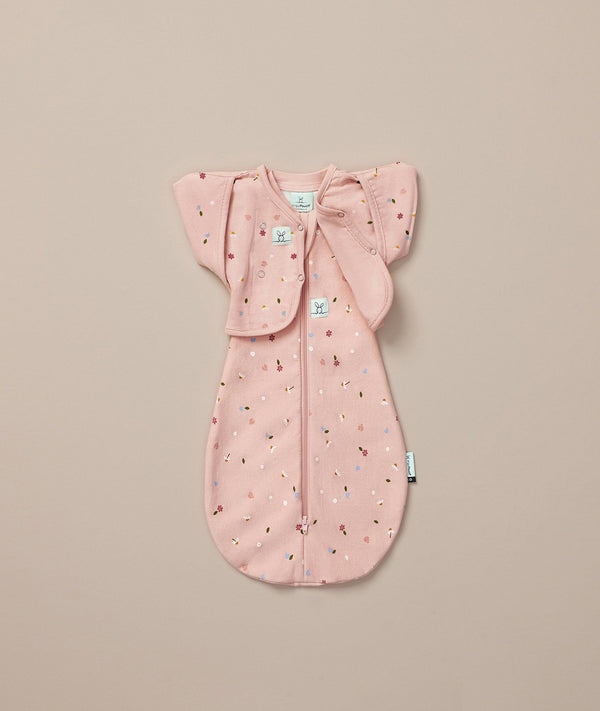 ergoPouch Butterfly Cardi Daisies on top of matching Cocoon Swaddle Sack