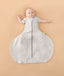 Baby sleeping with arms out in a ergoPouch Hip Harness Cocoon Swaddle Sack 1.0 TOG Grey Marle