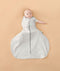 Baby wearing a ergoPouch Hip Harness Cocoon Swaddle Sack 1.0 TOG Grey Marle, transitioning to arms out sleeping