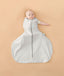 Baby wearing a ergoPouch Hip Harness Cocoon Swaddle Sack 1.0 TOG Grey Marle, transitioning to arms out sleeping