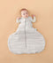 Baby sleeping with arms out in a ergoPouch Hip Harness Cocoon Swaddle Sack 2.5 TOG Grey Marle