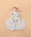 Baby in ergoPouch Hip Harness Cocoon Swaddle Sack 2.5 TOG Grey Marle, with legs open from hip dysplasia
