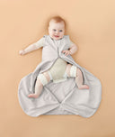 Baby in ergoPouch Hip Harness Sleep Sack 1.0 TOG Grey Marle, with legs open from hip dysplasia