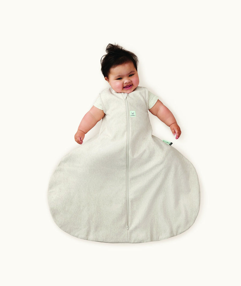 Baby in ergoPouch Hip Harness Sleep Sack 1.0 TOG Grey Marle, with hip dysplasia