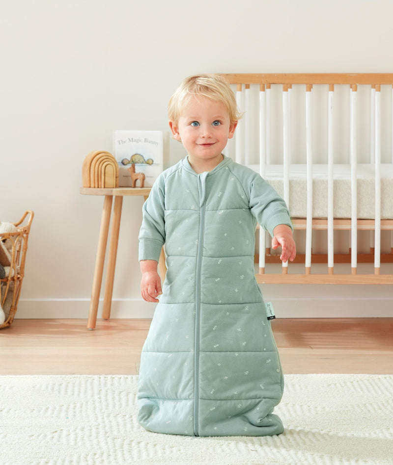 Toddler wearing ergoPouch Sleep Sack in Sage