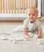 Infant playing with blocks wearing a light Sleep Sack 0.2 TOG Grey Marle