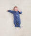 Five newborns wearing an ergoPouch Long Sleeve Romper in different colours