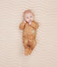 Newborn wearing ergoPouch Long Sleeve Romper 0.2 TOG Honey Bees