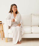 Woman wearing an ergoPouch Matchy Matchy Robe Oatmeal Marle