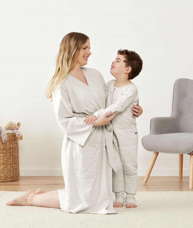 Mom embracing her toddler wearing an ergoPouch Matchy Matchy Robe Grey Marle