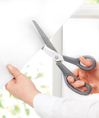 Close up of ergoPouch Window Blockout White being cut to size