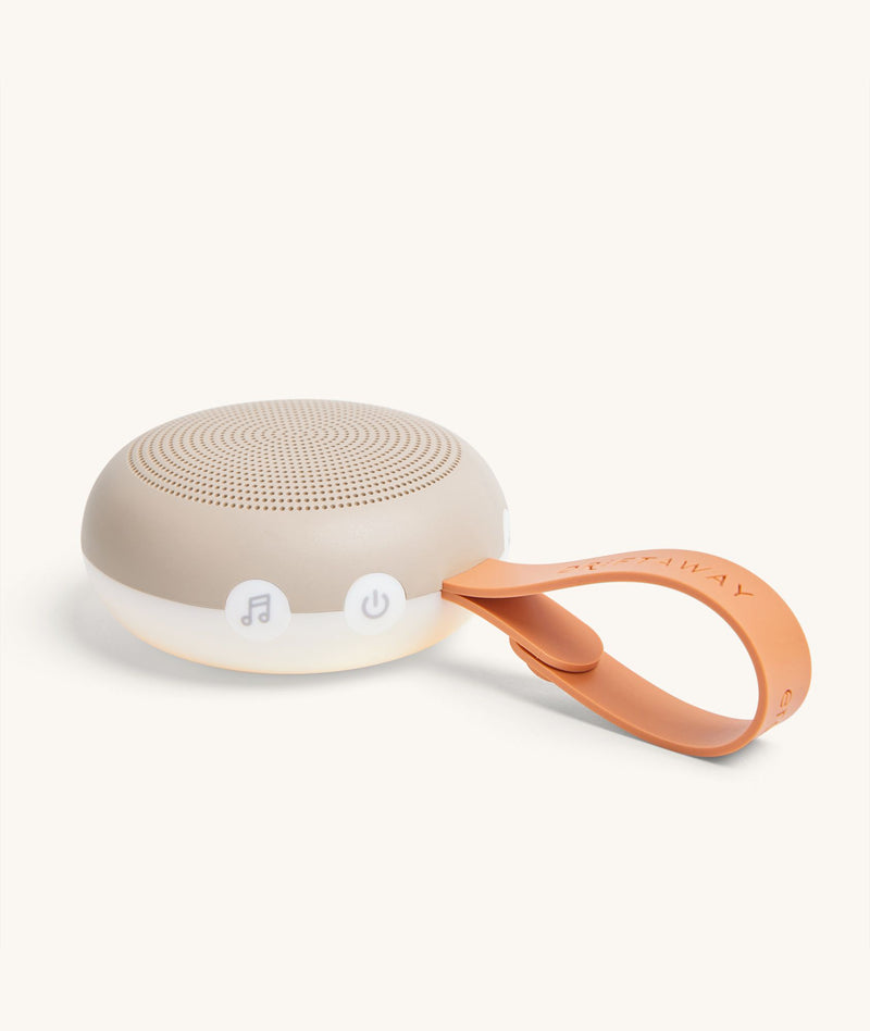 ergoPouch Drift Away White Noise Machine, featuring control buttons and night light at the base.