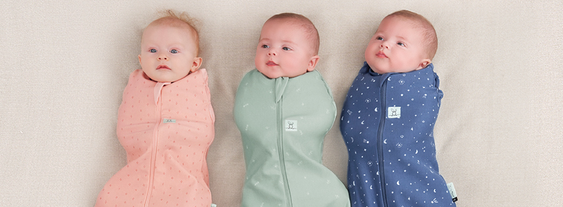 New babies in Cocoon Swaddle Bags, our top pick for newborn sleep essentials.