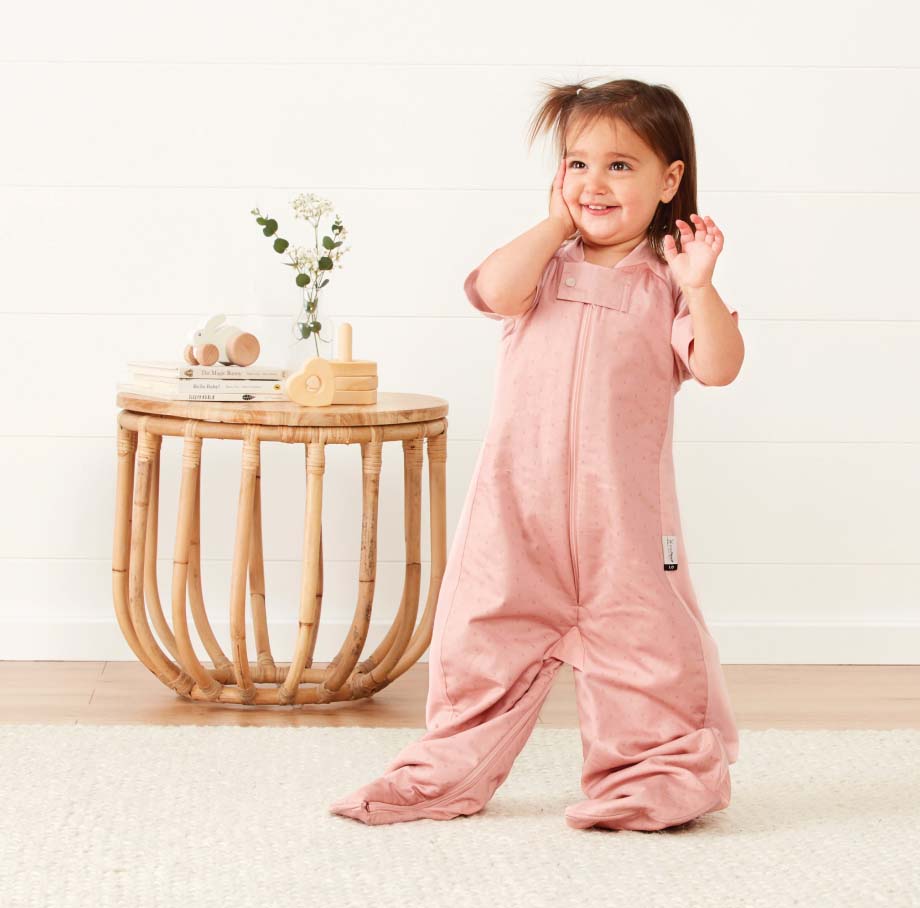 Toddler standing in Sleep Suit Sack