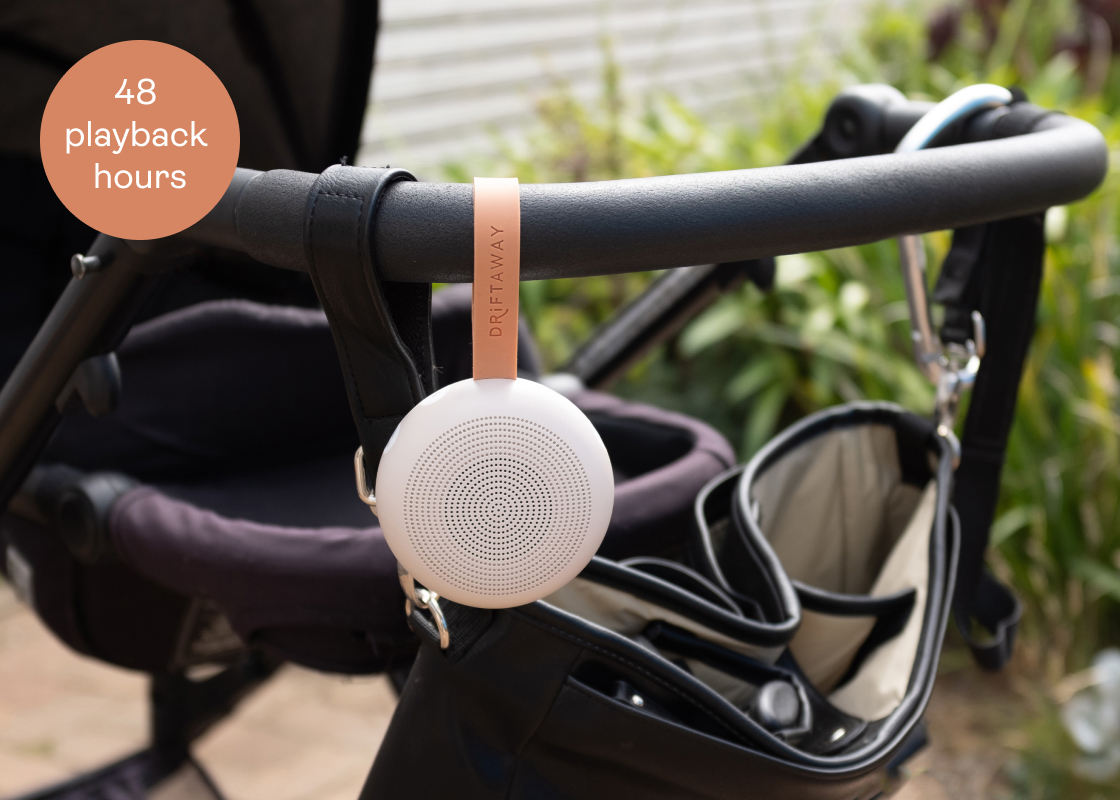 Portable white noise machine for baby attached to stroller